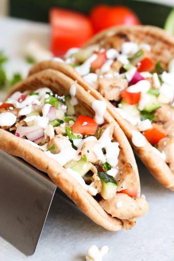 DAY 7 SMALLER FAMILY- MEDITERRANEAN CHICKEN PITA TACOS M A I N D I S H Serves: 4 Prep Time: 10 Minutes Cook Time: 2 cups grilled chicken (cooked and diced) 1 roma tomato (diced) 1/2 cucumber (diced)