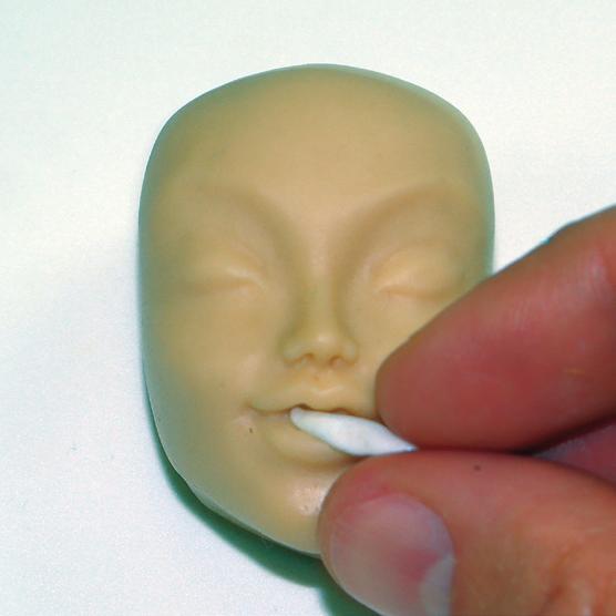 Make holes to create nostrils and from the base of