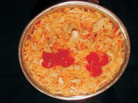 Specially flavored saffron rice cooked with boneless pieces of chicken Lightly spiced