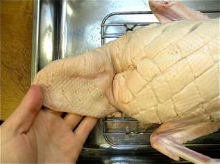 roast a duck: Trim off any excess skin