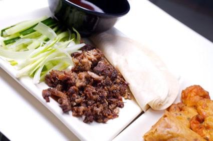 P9 CHEF RECOMMENDED STARTERS Aromatic Crispy Duck (Served with Pancakes, Salad and Hoi Sin Sauce) Quarter Half 21.