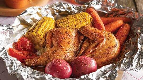 CAMPFIRE CHICKEN We hope you ll remember times around the fire with our tender campfire spice-seasoned half chicken, fresh carrots, sweet corn on the cob, red skin