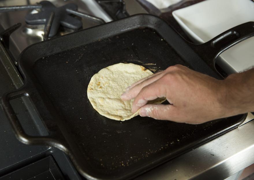Once it lifts, flip the tortilla and cook until it starts to slightly puff up, indicating that it s fully cooked.