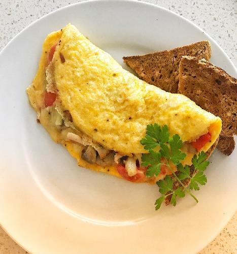 with spray oil, season with salt and pepper - While the mushrooms are cooking, toast the bread - Top the toast with the eggs and mushrooms Calories: 385 (1617kj) Total fat: 16g Fibre: 4g Protein: 23g