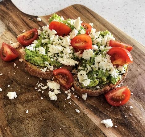 pepper to taste - Slice the tomatoes in halves or quarters - Toast the bread, top with the mashed avocado, sliced tomatoes and crumble over the feta cheese Calories: 382 (1604kj) Total fat: 21g
