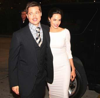 celebrazzi (celebrations-paparazzi) Brad Pitt and Angelina Jolie came to their New Orleans home base for the screening of The Curious Case of Benjamin Button, Brad's
