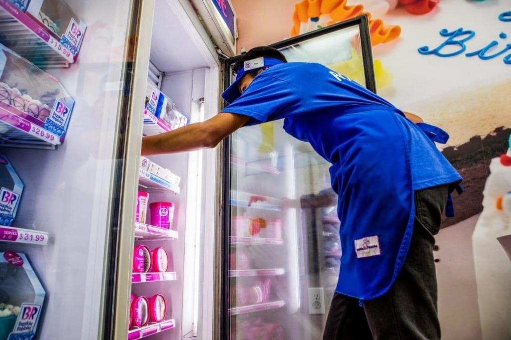 Baskin-Robbins employee Alex Soe rushes to fill the DoorDash order in Daly Ci