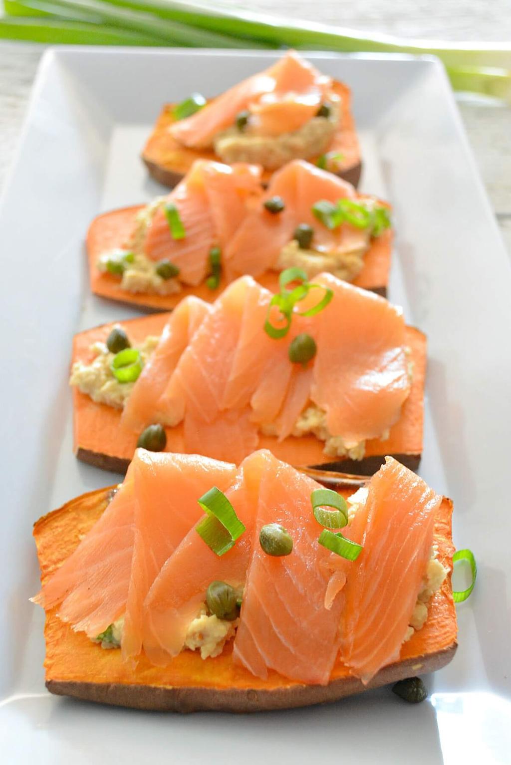 SALMON Caper Toast Prep Time: 10 minutes Cook Time: 5 minutes Serves: 4-8 1-2 sweet potatoes, ends cut off and sliced ¼-inch thick 3 oz smoked salmon, sliced into 1-inch strips 1 T capers ⅓ cup Paleo