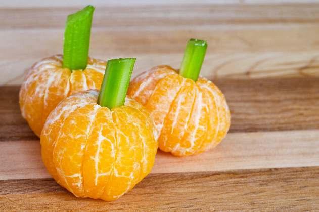 Mandarin Pumpkins Ingredients: Mandarin oranges, peeled Small celery stalk (cut to about 1 inch long) Take a Mandarin orange and insert the cut celery
