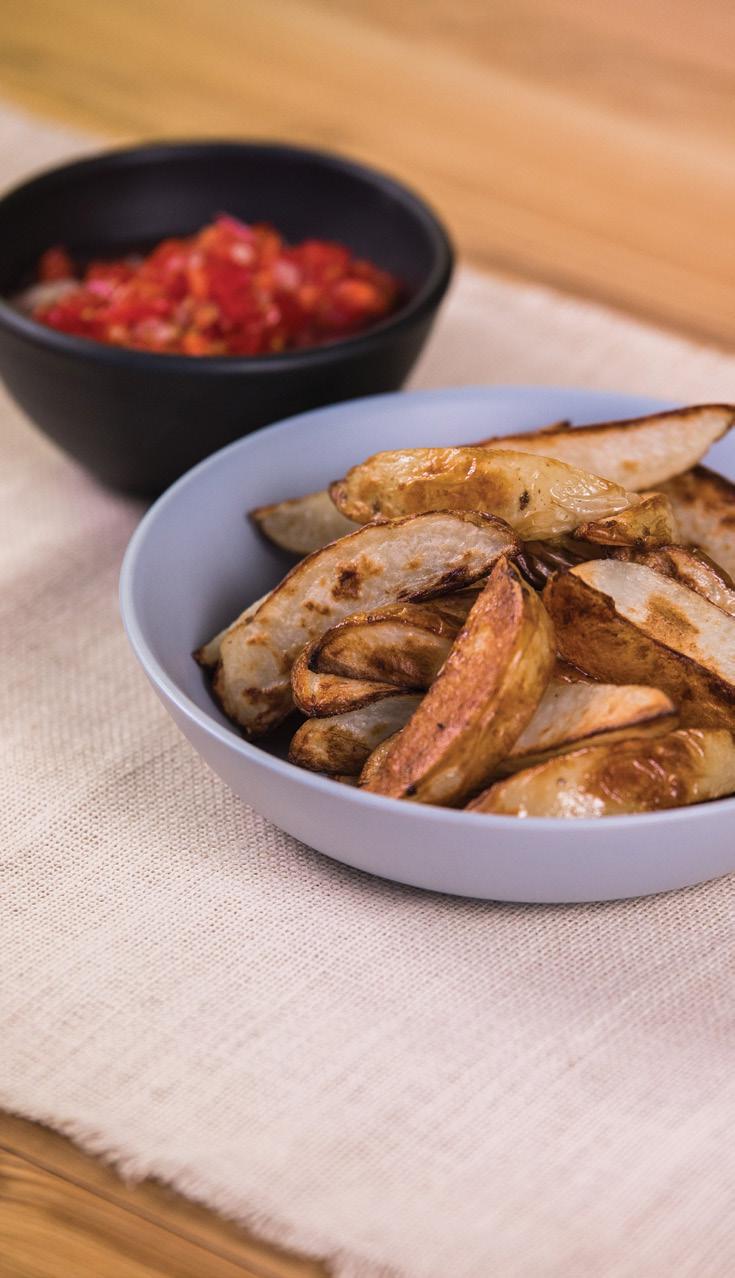 Wedges with tomato salsa Ingredients Serves Wedges potatoes, washed and sliced into wedges tablespoon oil Tomato salsa tomatoes, cored and diced / spring onion, finely sliced pepper to taste teaspoon