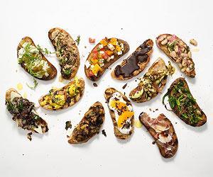 50 Bruschetta Crisp Bread Croutons and a selection of traditional toppings of Basil Pesto,