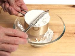 Measuring for Recipes: Dry Ingredients Spoon ingredient into measuring cup until it is overfilled.