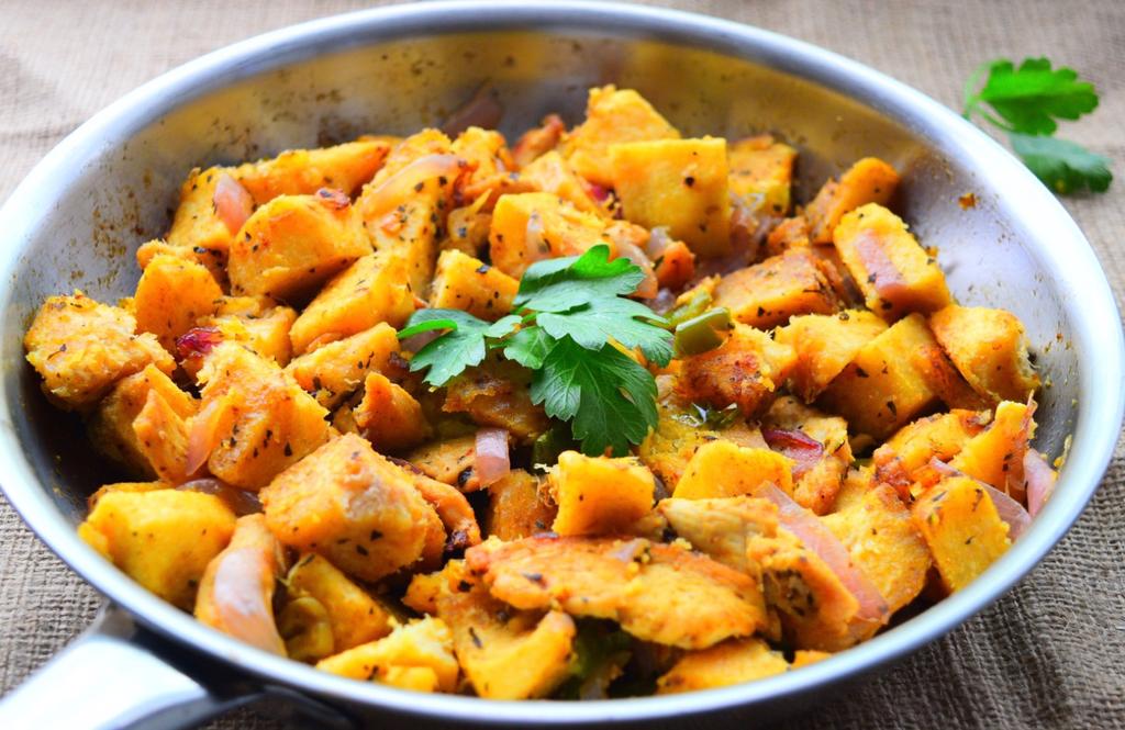 Spicy Pan-Roasted Yam with Chicken Breast Ingredients: 1-pound white yam, peeled and cut in small cubes 7-ounce skinless, boneless chicken breast, cut in chunks 3 4 tablespoon olive oil 2 garlic