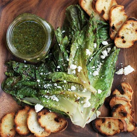 GRILLED ROMAINE SALAD WITH COTIJA CHEESE AND LIME VINAIGRETTE Cotija is a hard cow s milk cheese from Mexico. If you cannot find cotija, feta is a handy substitute. Prepare the vinaigrette.