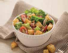 Caesar Salad with Garlic Pepper Croutons 4 cups cubed take n bake French baguette bread ¼ cup butter, melted 5 tablespoons grated Parmesan cheese, divided 1 teaspoon Garlic Pepper Seasoning 18 ounces
