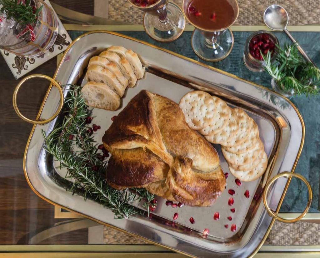 cranberry baked brie 1 pound of Brie 1 large or 2 small wedges placed in the form of a triangle 1 frozen puff pastry, thawed to directions 1 cup whole berry cranberry sauce 1 egg,