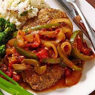 Swiss Steak Heat the oil in a skillet over medium heat. In a bowl, mix the flour, salt and pepper, and paprika. Dredge the steaks in the flour mixture, and place in the skillet.