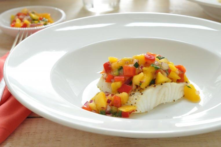 Halibut and Mango Prepare grill. Combine first 7 ingredients. Stir in 1/2 teaspoon salt, 1/2 teaspoon pepper, and garlic. Rub halibut with oil; sprinkle with 1/2 teaspoon salt and 1/2 teaspoon pepper.