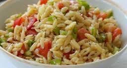 Chicken and Orzo Salad In a large bowl, combine the orzo, chicken, tomatoes, corn, red onion, and green onion.