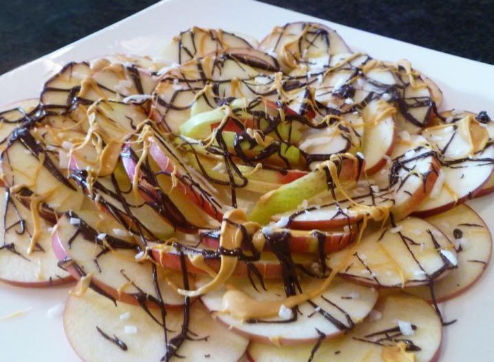 Apple Nachos On a large plate, arrange apple slices on top of one another. Drizzle half the chocolate and caramel syrups, then top with pretzels.