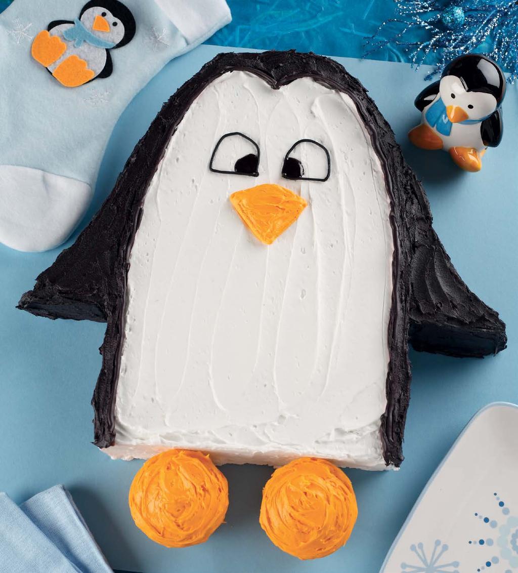 Penguin Pans Muffin pan Frosting (page 14) or 1 (16-ounce) can white frosting, divided, 1 3 colored black and 2 3 left white 1 tube yellow decorating icing Preheat oven to 350 degrees.