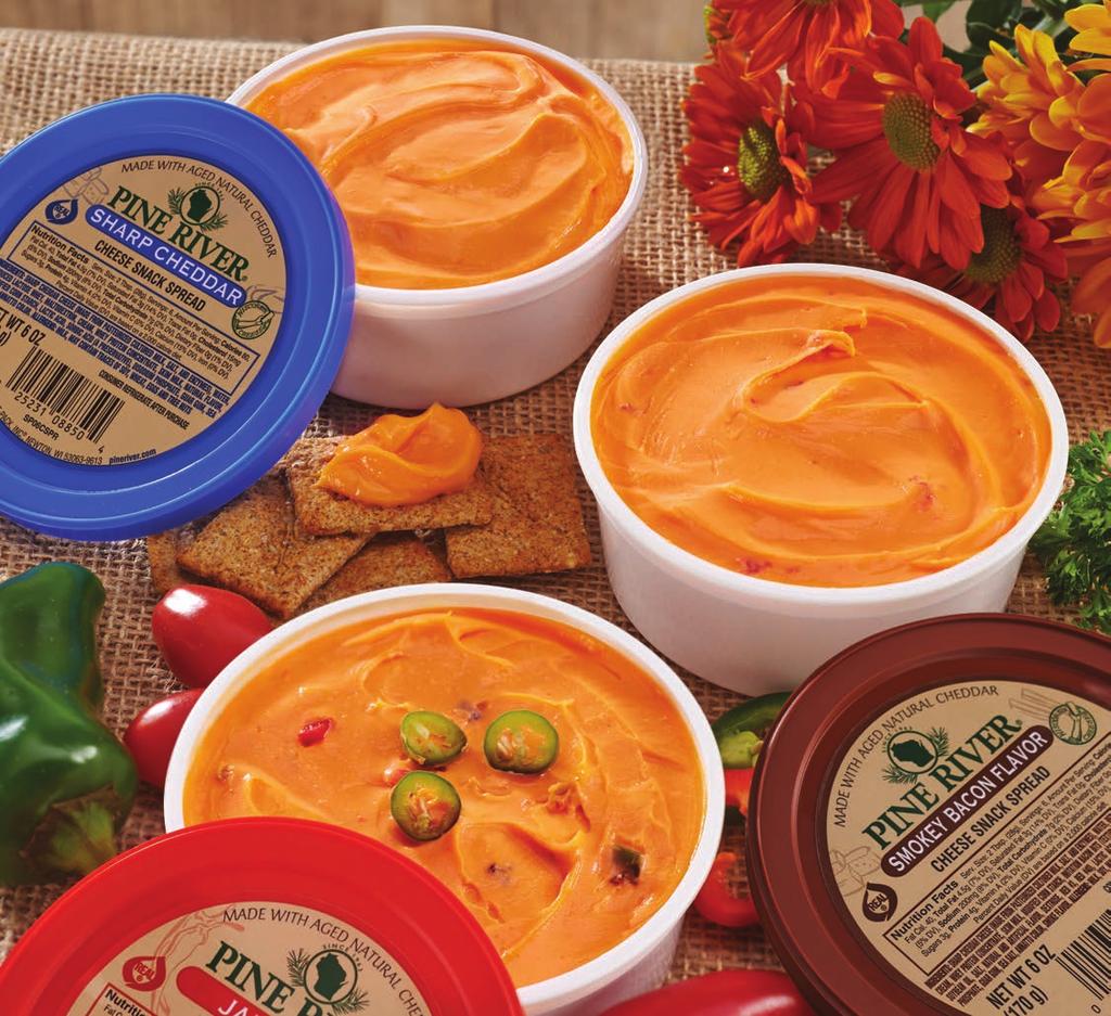 About Our Snack Spread Pine River Snack Spread is a pasteurized blend of natural Cheddar cheese and other dairy ingredients. Flavored with herbs and spices.