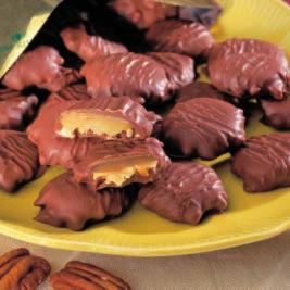 Pecans and chewy vanilla caramel are coated