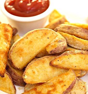 Baked red potato wedges Serves 6 prep time: 10 mins Cook time: 40 mins 6-8 red potatoes, cut into lengthwise quarters (each potato cut into 8 wedges) 3-4 Tablespoons olive oil 3 Tablespoons flour 2