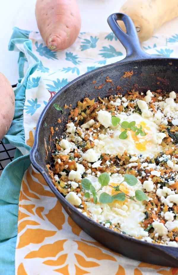 SWEET POTATO HASH WITH FETA AND EGG Adapted from EA Stewart, Serves 4 2 medium sweet potatoes (about 4 cups shredded) 2 tablespoons extra virgin olive oil 1 medium onion, finely chopped 4 cups
