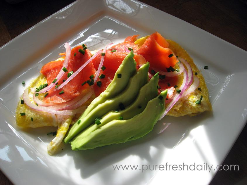 breakfast omelette with smoked salmon, red onion avo + capers serves 1 1 Tbsp olive oil 2 slices smoked salmon 3 free range eggs, beaten 1/4 red onion sliced 1 teaspoon capers 1/4 avocado sliced salt