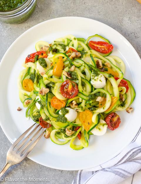 dinner serves 4 6 Zucchini 2 Tbsp olive oil 1 clove garlic 1 long red chilli, seeded + finely chopped 200g cherry tomatoes (red + yellow if you can) 400g tin tomatoes 1/4 cup basil, roughly torn salt