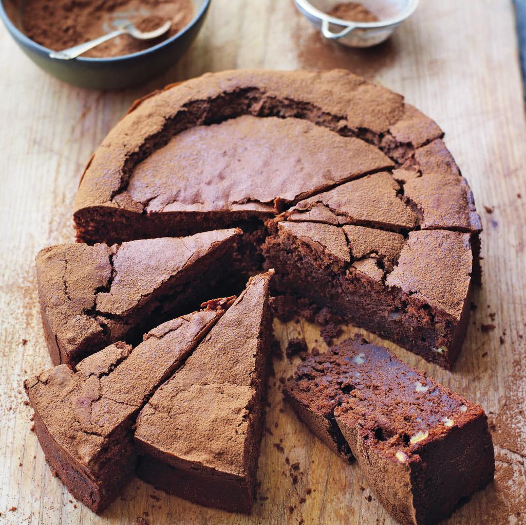 Chocolate, pumpkin and pecan cake SERVES 8 125g (4oz) pecan nuts 1 tsp cayenne pepper 225g (7½oz) dark chocolate, roughly 150g (5oz) unsalted butter, plus extra for greasing 3 free-range eggs 275g
