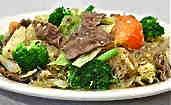 Pad Kee Mao l Spicy Thai Basil Noodles $13 Wide rice noodles, green beans, onions, tomato, bell peppers,