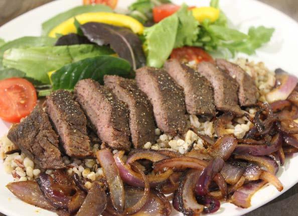 Marinated ostrich with caramelised onions 15ml Worcestershire sauce 10ml soy sauce 15g tomato ketchup 2 x 125g ostrich steaks 1 tsp extra virgin olive oil 150g red onion, finely sliced 1 garlic