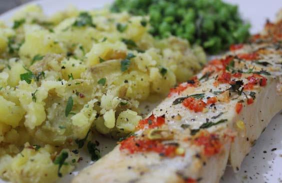 Fiery baked haddock with minted peas & crushed garlic potatoes 400g baby potatoes 1 red chilli pepper, chopped 2 cloves garlic, finely chopped juice of 1 lemon 1 tsp olive oil 360g fresh haddock loin