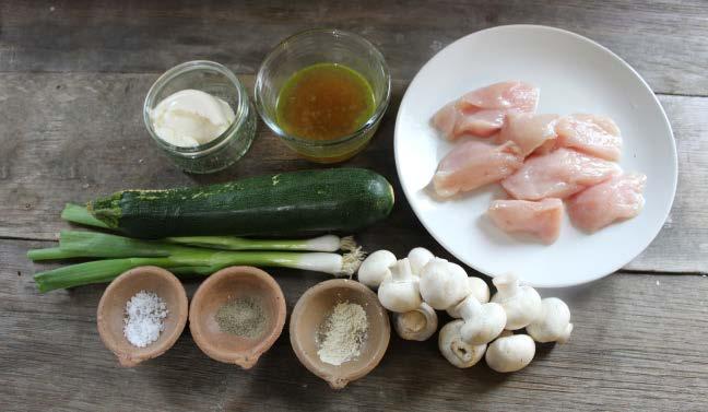 oil in a frying pan over a medium heat. Add the spring onions and courgette and sauté gently for 2-3 minutes, stirring. Add the mushrooms and sauté for 2-3 minutes, stirring until soft.