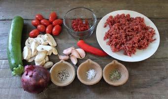 saucepan over a medium heat. Add the onion and sauté for 2-3 minutes. Add the steak mince and cook for 4-5 minutes, stirring. Add the chilli and garlic and sauté for 1-2 minutes.