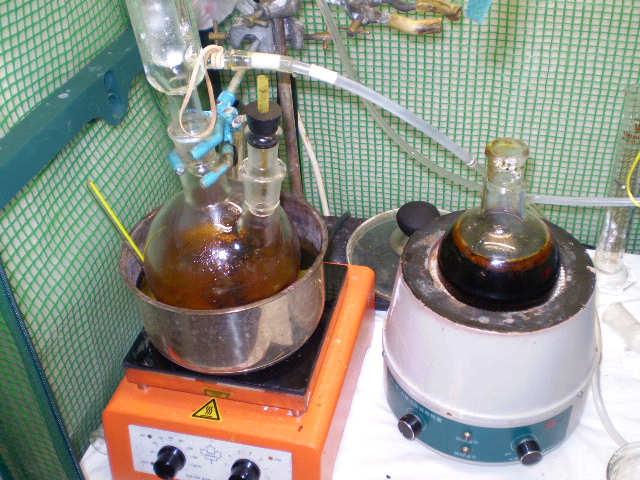 Once the DMSO/DCM mixture was nicely refluxing (oil bath at round 125 deg C), 15 more minutes were allowed for the addition mixture to stir before addition was started.
