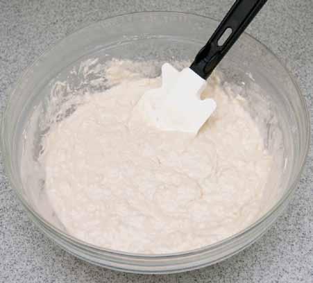 5 4 Half the flour, (the vital wheat gluten, if used), sugar, and yeast are combined. Then the warm liquid is poured in and combined.
