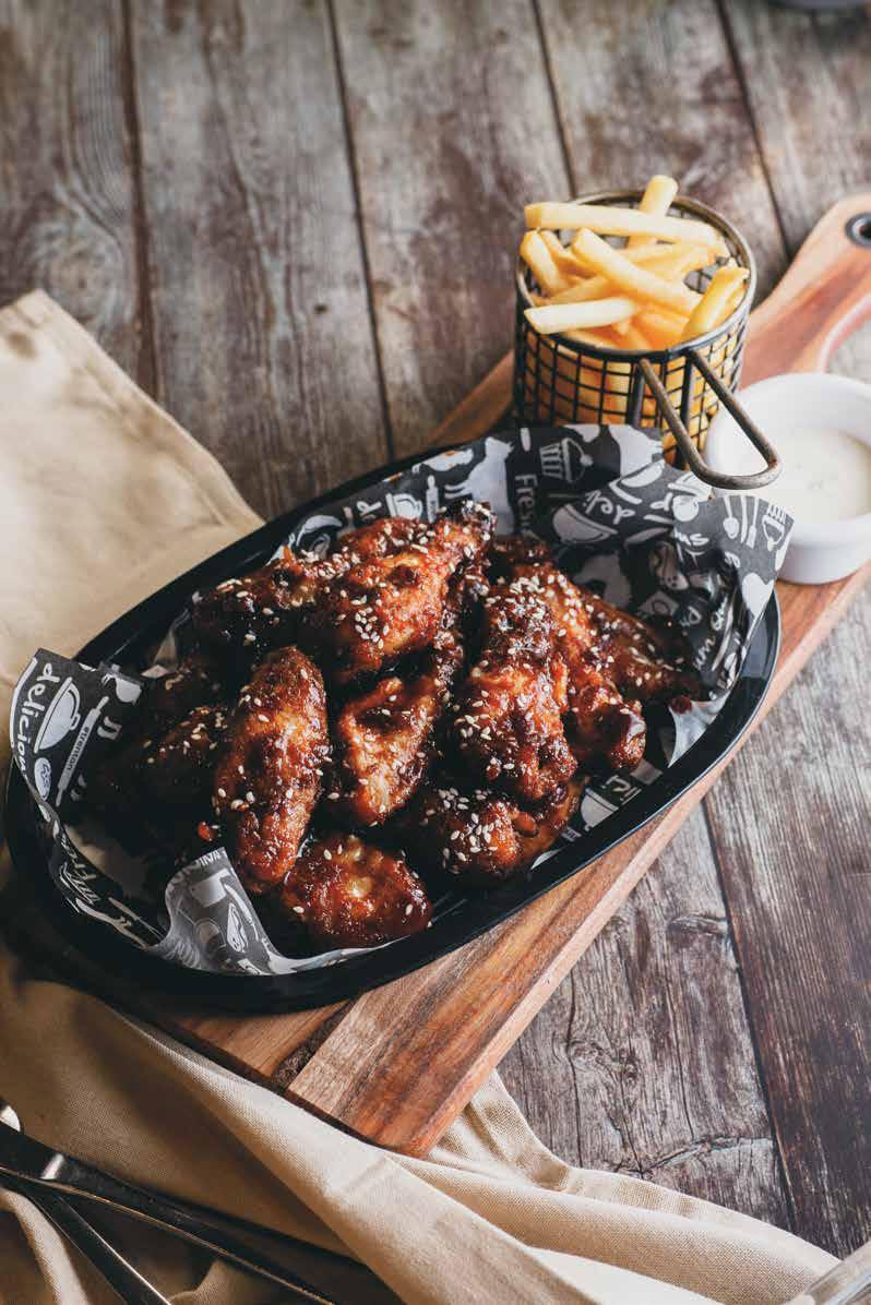 TENDER WINGS COATED IN OUR UNIQUE WET SAUCES AND DRY RUBS. ALL WINGS ARE SERVED WITH A SIDE OF CHIPS AND LOST BARREL S RANCH DIPPING SAUCE.