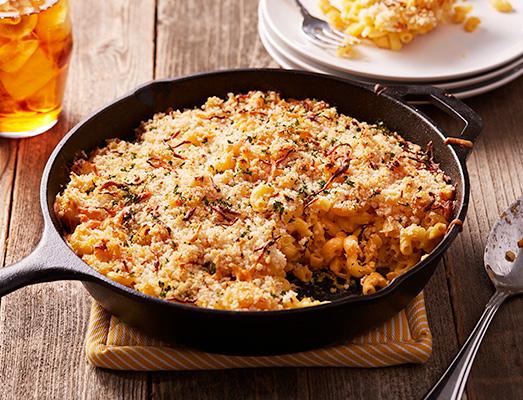 Mac N Cheese 1 pound elbow macaroni 2 tablespoons unsalted butter 1/4 cup all-purpose flour 3 cups skim milk 2 cups shredded cheddar cheese 1 1/4 cup grated Parmesan cheese 1/2 cup panko bread crumbs