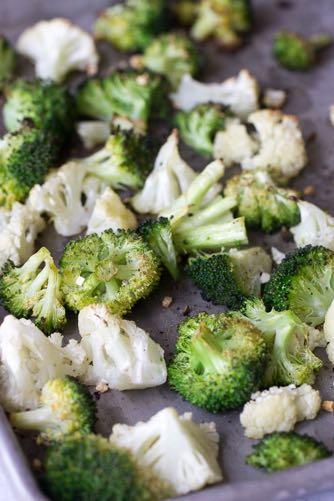 OVEN ROASTED BROCCOLI AND CAULIFLOWER S I D E D I S H Serves: 4 Prep Time: 5 Minutes Cook Time: 20 Minutes Calories: 58.4 Fat: 2 Carbohydrates: 6.2 Protein: 2.4 Fiber: 2.5 Saturated Fat: 0.