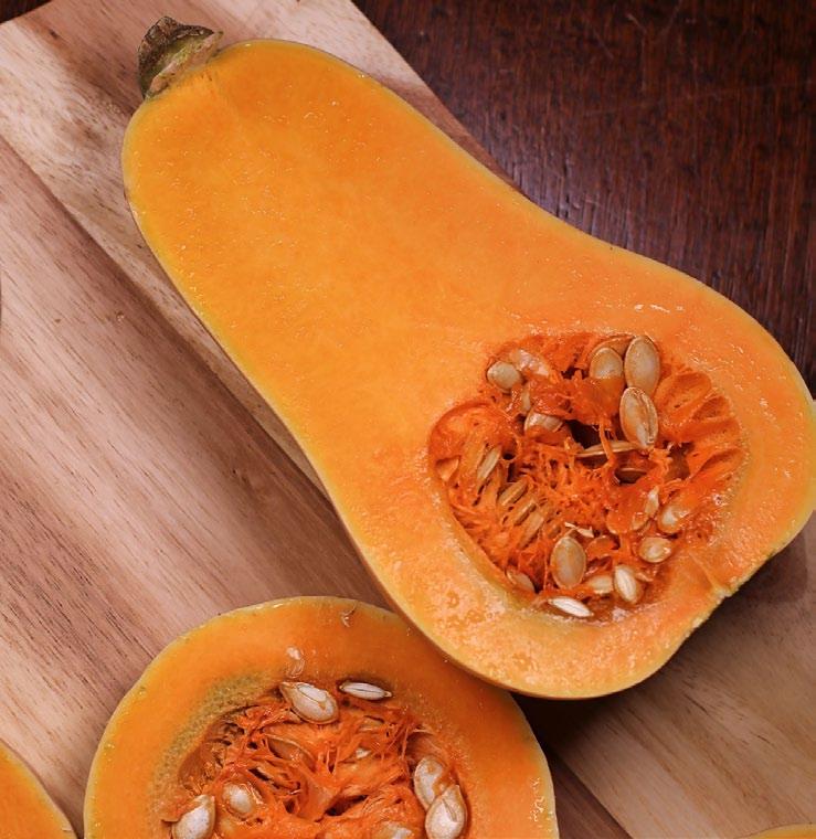 Place squash in a medium baking pan. Roast for 1 hour, or until flesh is easily pierced with a knife. Let cool. 2. Halve the squash, and remove the seeds. Roughly chop the flesh. Reserve. 3.