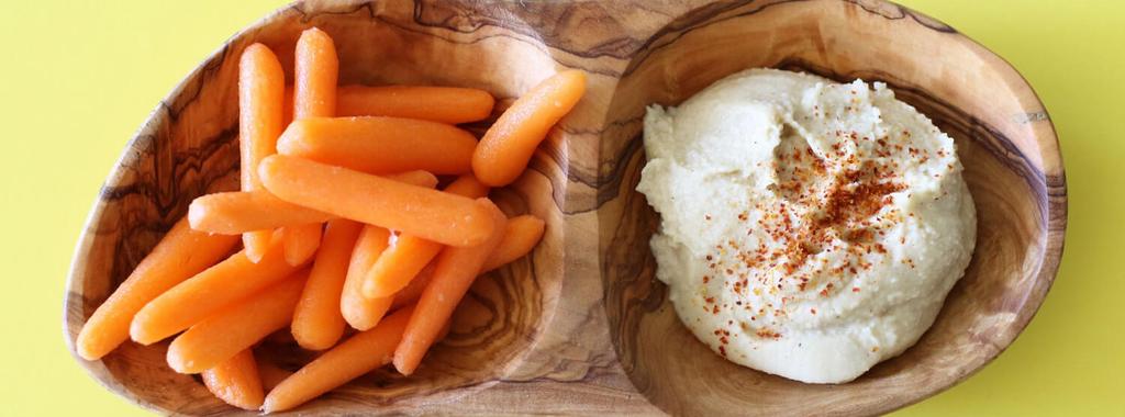 Baby Carrots & Hummus 2 ingredients 5 minutes 4 servings 1. Divide carrots between bowls. Serve with hummus on the side for dipping. Enjoy!