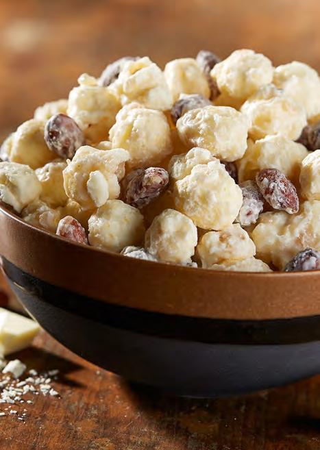 White chocolate covered popcorn combined with sugared almonds! A special Gourmet Treat.