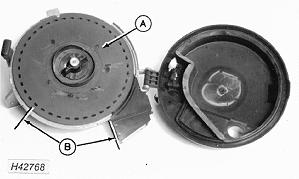 6. Install sweet corn or edible-bean disk (A) and attach with hub handle. NOTE: Seed disk should turn smoothly with light contact or small gap between seed disk and housing.