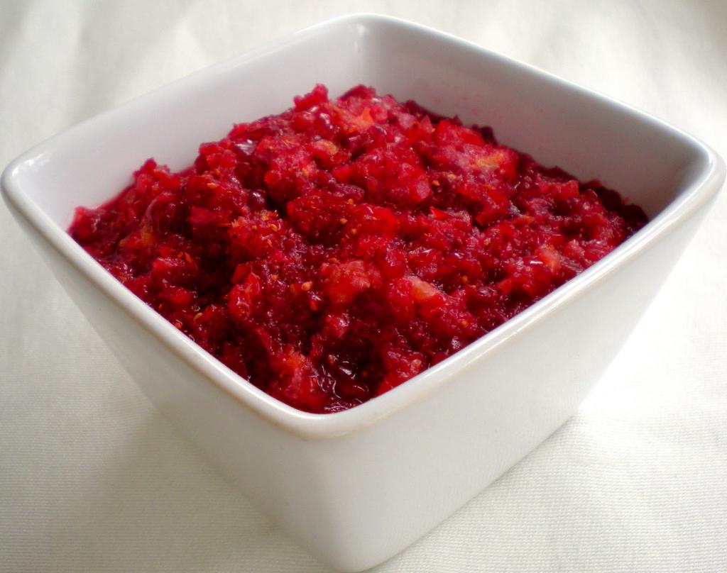Cranberry Relish 1 orange 2 cups fresh or frozen cranberries (thawed if frozen) 1 cup red apple (approx. 1 med.