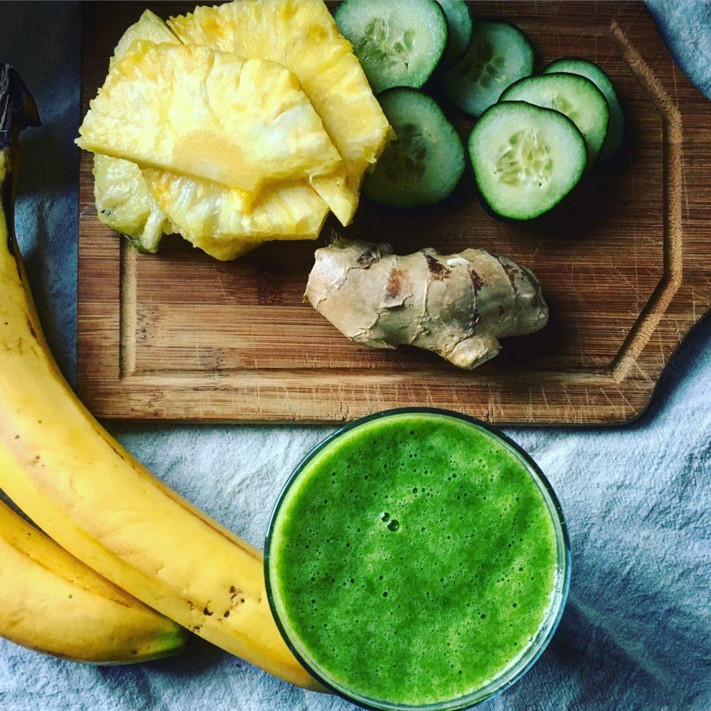 CLEANSING SMOOTHIE 1 banana, frozen 1 cup fresh or frozen pineapple chunks 1/2 large cucumber, sliced (peeled if not organic) 2 cups lightly packed spinach 1-inch piece