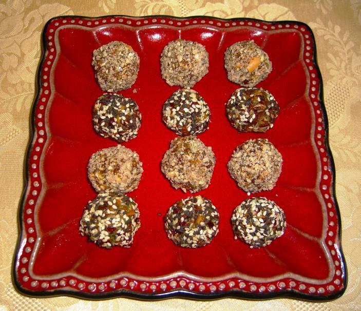 4 dried figs, minced 1 tablespoon raisins, minced 1 generous teaspoon honey, room temperature ½ teaspoon ground cinnamon raw sunflower seeds, minced Note: It is important that all ingredients be