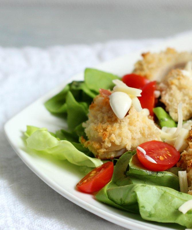 ENTREES Crispy Chicken Cobb Salad 1 cup panko bread crumbs ½ tsp salt 1 egg 4 chicken tenders 6 cups bibb lettuce ½ cup halved cherry tomatoes ¼ cup crumbled cooked bacon ¼ cup shredded cheddar